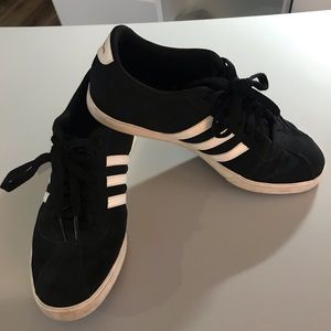 Woman’s size 7M black suede Adidas sneaker